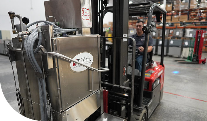 Distribution Center employees moving boxes for clients