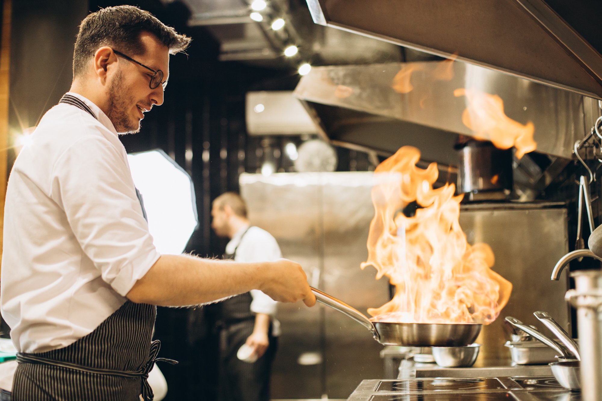 chef cooking at hotel kitchen